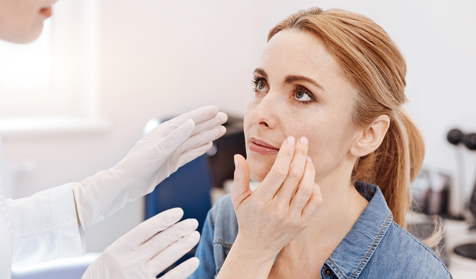 doctor and patient talking about face